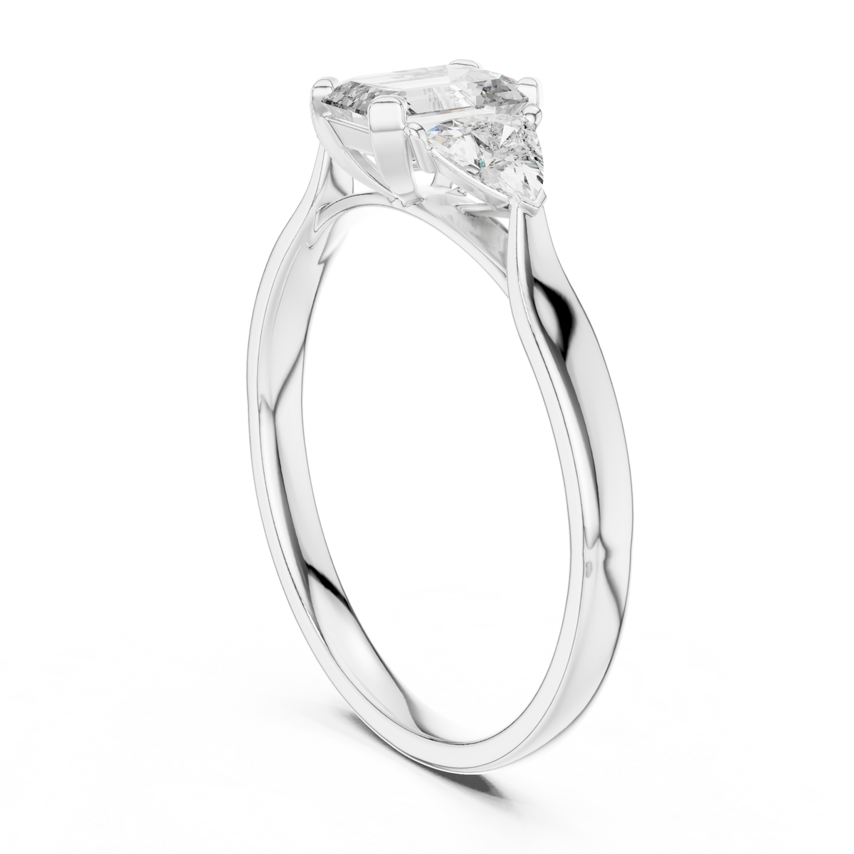 emerald cut three stone engagement ring with trillion side stones