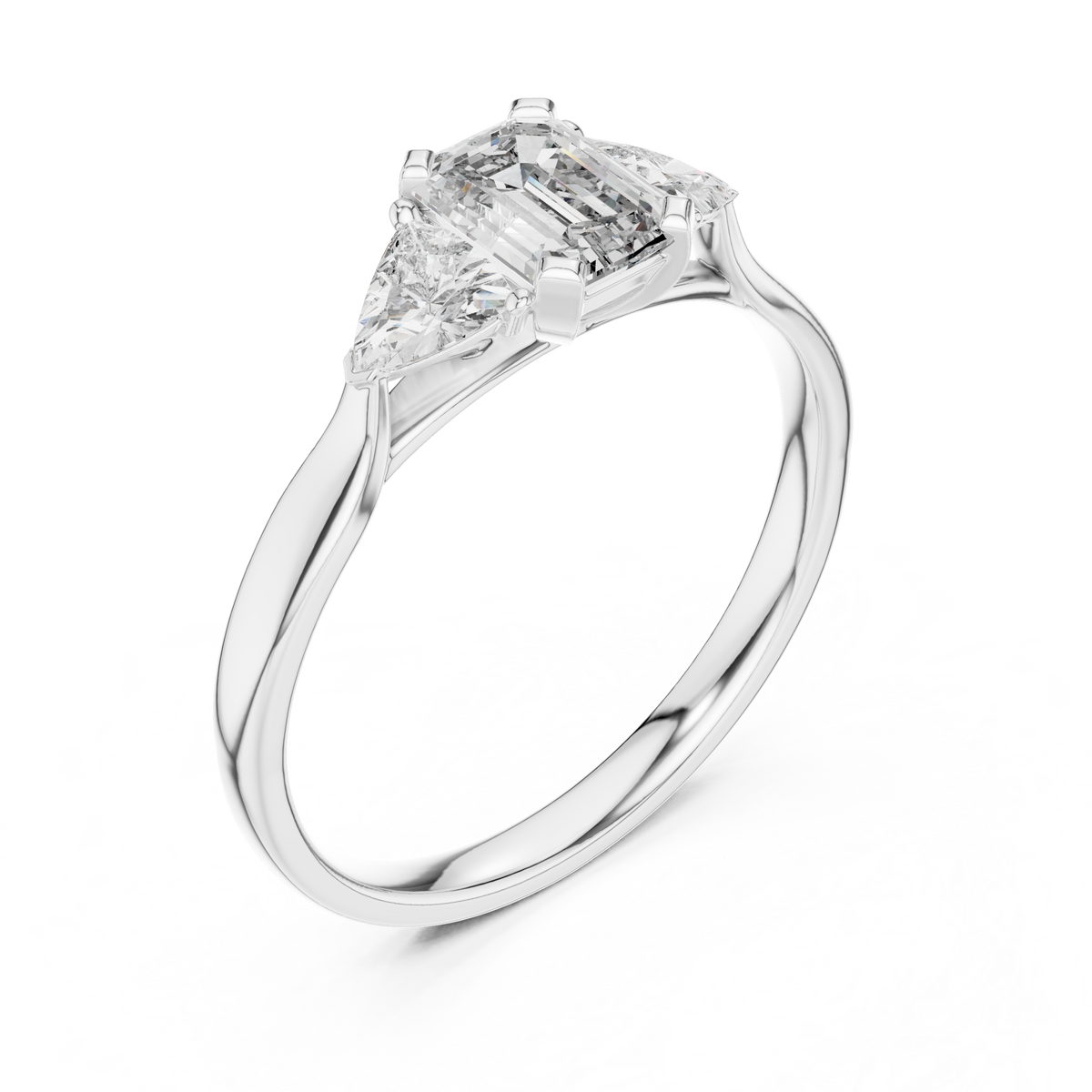 emerald cut three stone engagement ring with trillion side stones