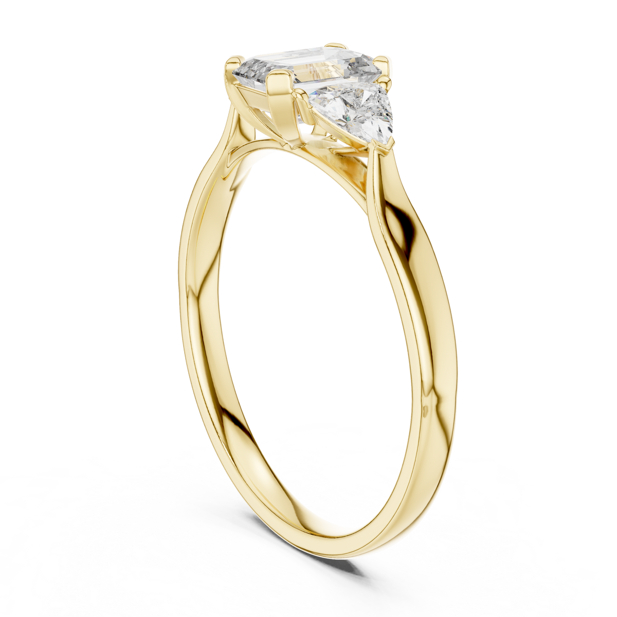 emerald cut three stone engagement ring with trillion side stones