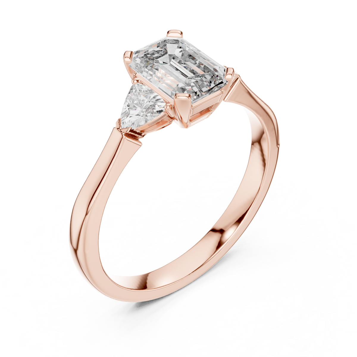 emrald cut with two trilion stone ring