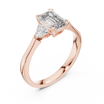 Emrald Cut With Two Trilion Stone Ring
