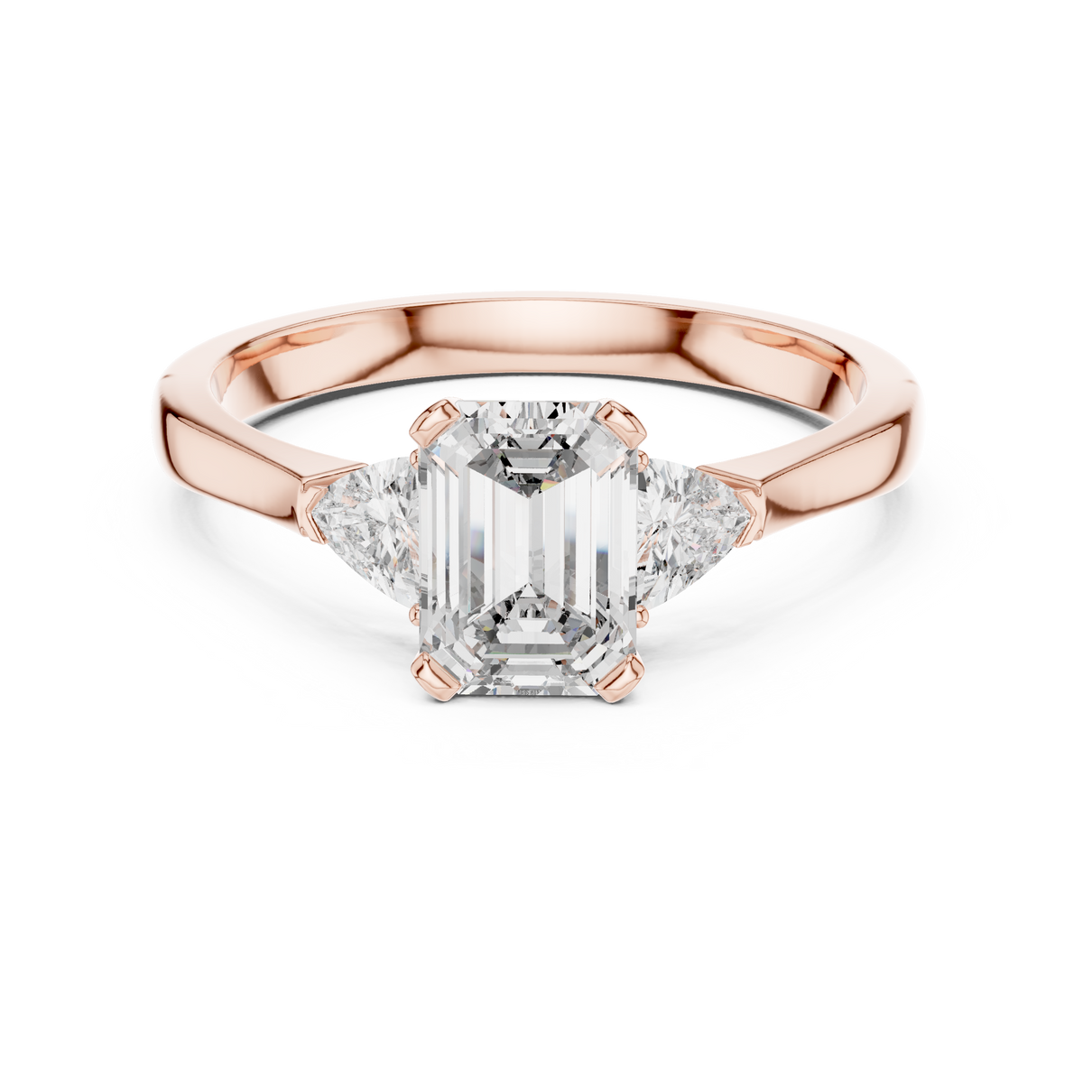 emrald cut with two trilion stone ring