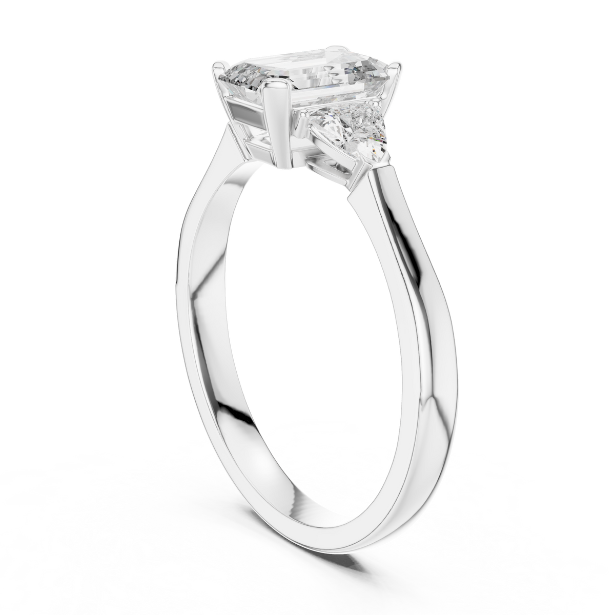 emrald cut with two trilion stone ring