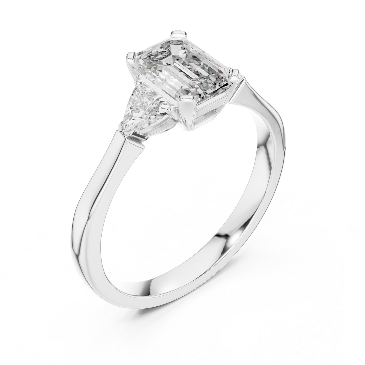 emrald cut with two trilion stone ring