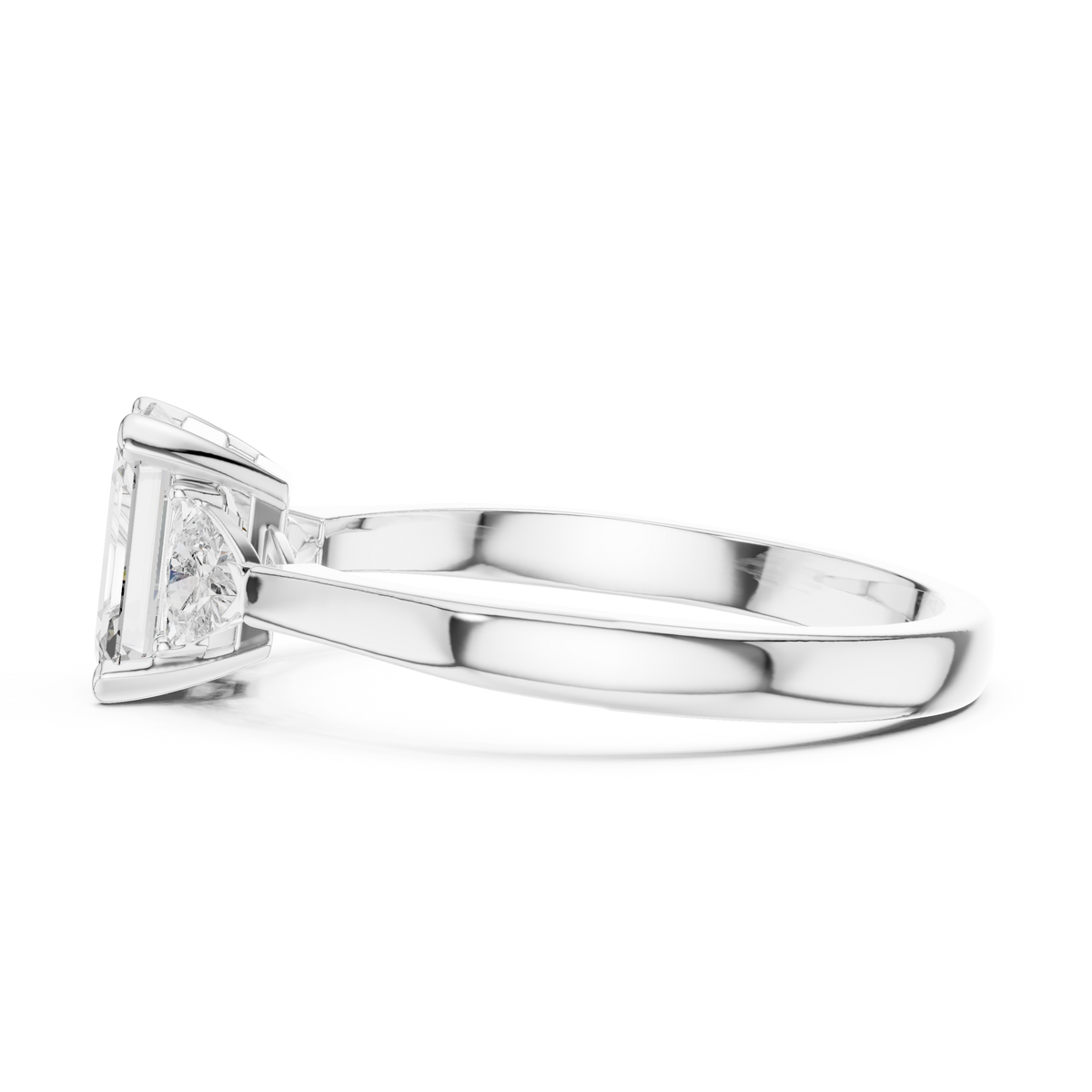 emrald cut with two trilion stone ring