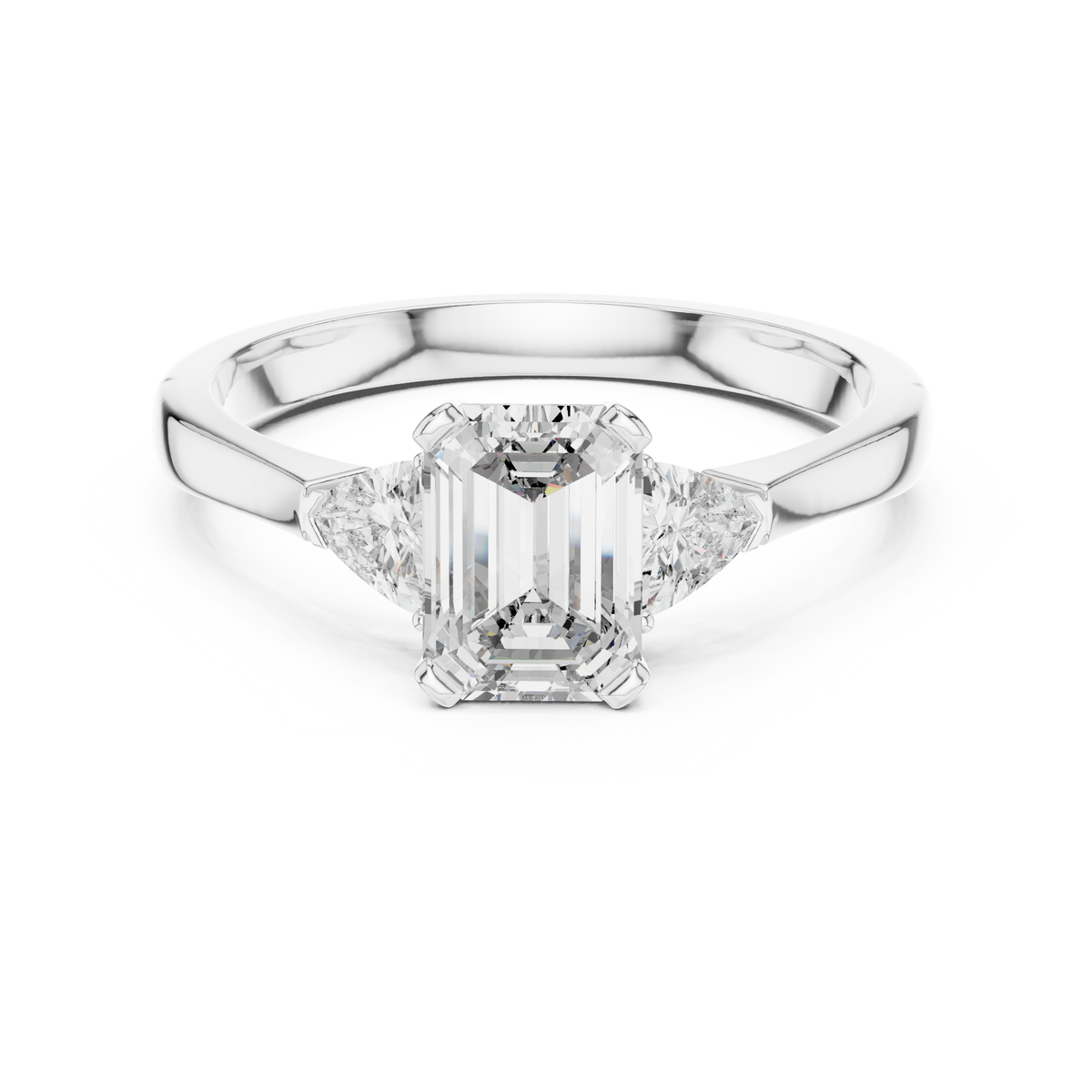 emrald cut with two trilion stone ring