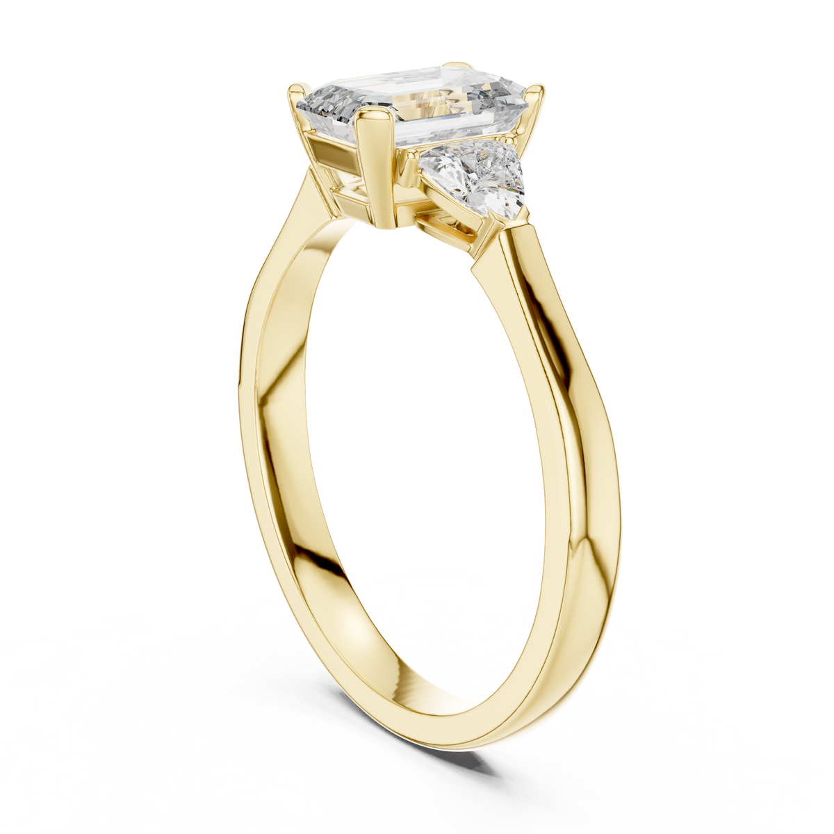emrald cut with two trilion stone ring