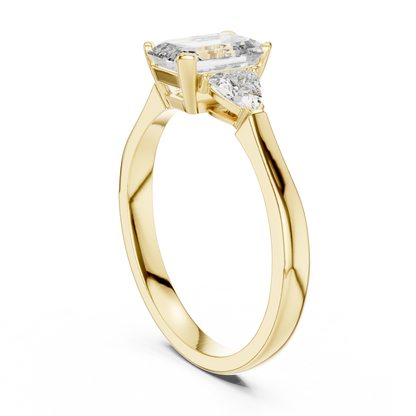 Emrald Cut With Two Trilion Stone Ring
