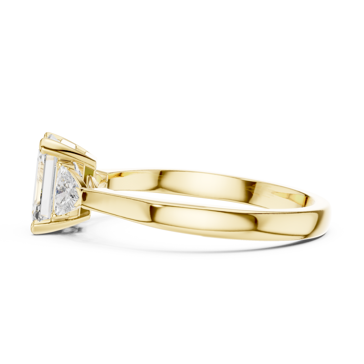 emrald cut with two trilion stone ring