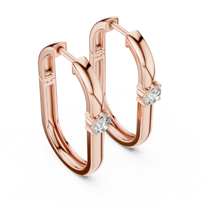 square geometric diamond solitaire huggie hoop earrings  rectangular or square profile. A single round brilliant-cut solitaire diamond