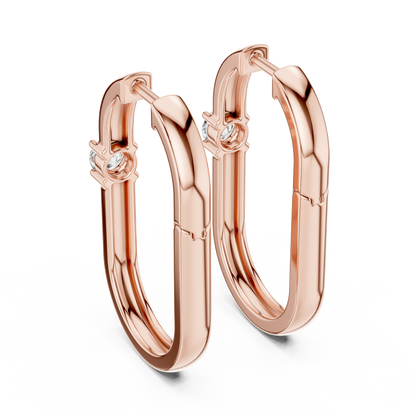 square geometric diamond solitaire huggie hoop earrings  rectangular or square profile. A single round brilliant-cut solitaire diamond