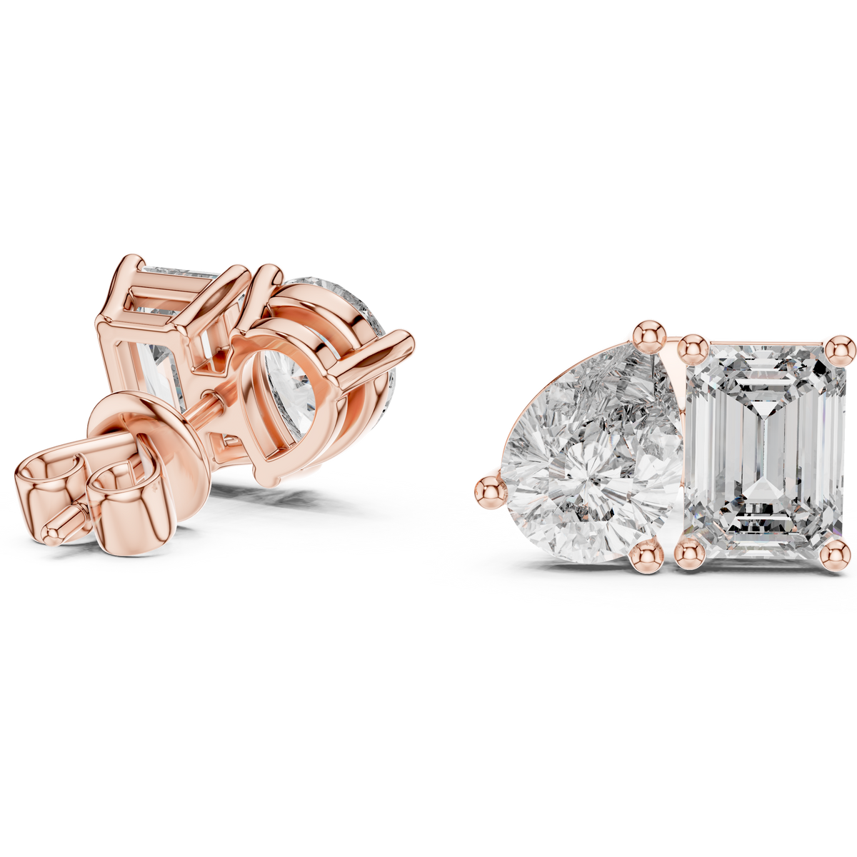 "toi et moi" style diamond stud earrings emerald diamond pear diamond