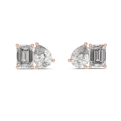 "Toi et Moi" style diamond stud earrings emerald diamond pear diamond