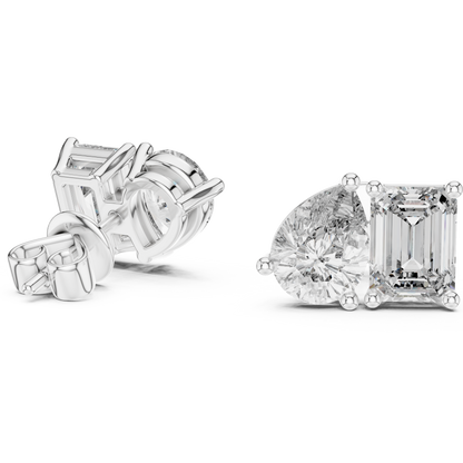"Toi et Moi" style diamond stud earrings emerald diamond pear diamond