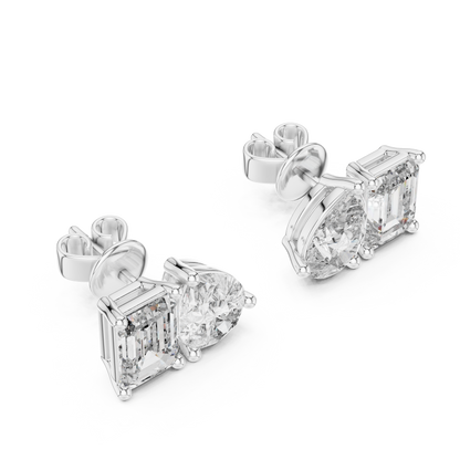 "Toi et Moi" style diamond stud earrings emerald diamond pear diamond