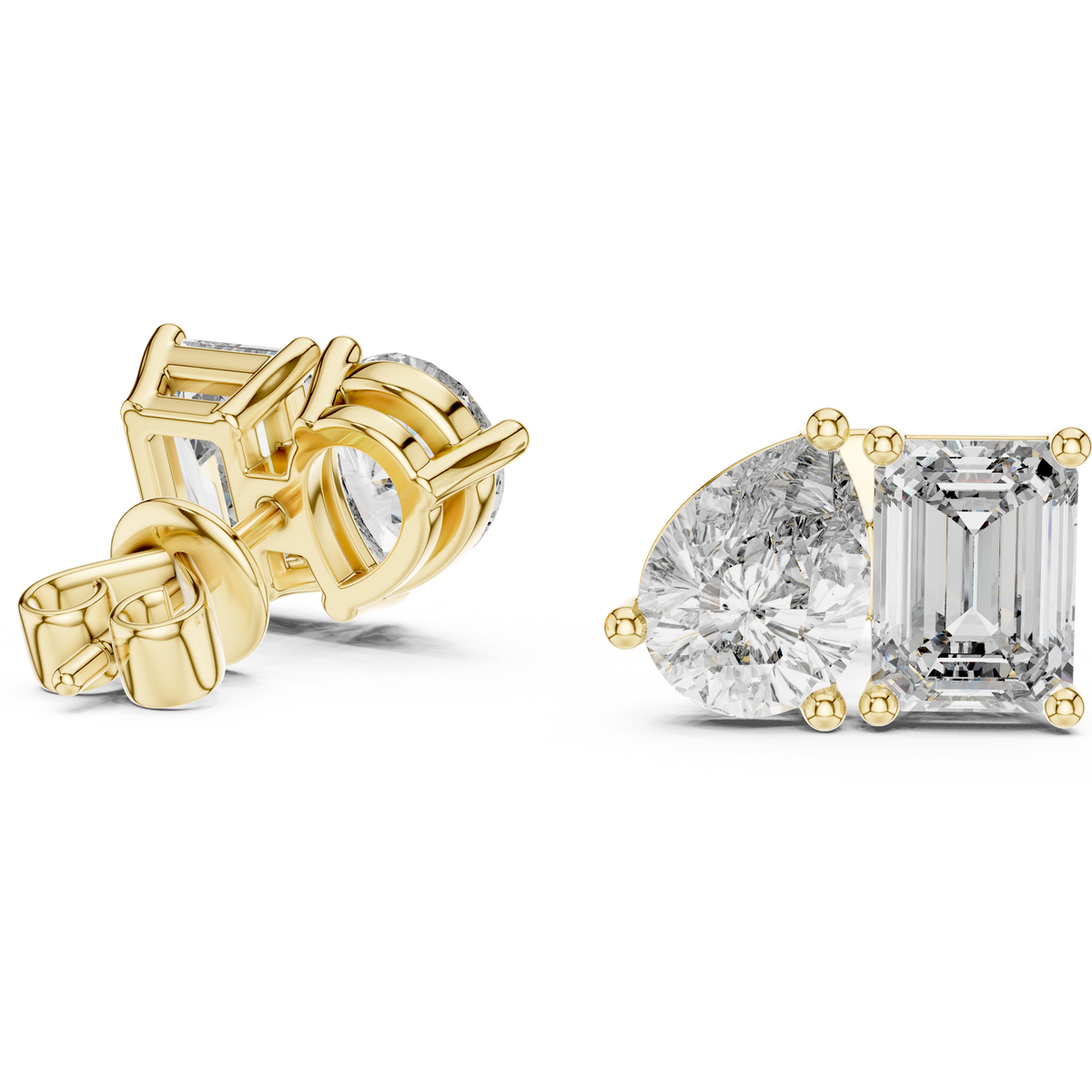 "toi et moi" style diamond stud earrings emerald diamond pear diamond