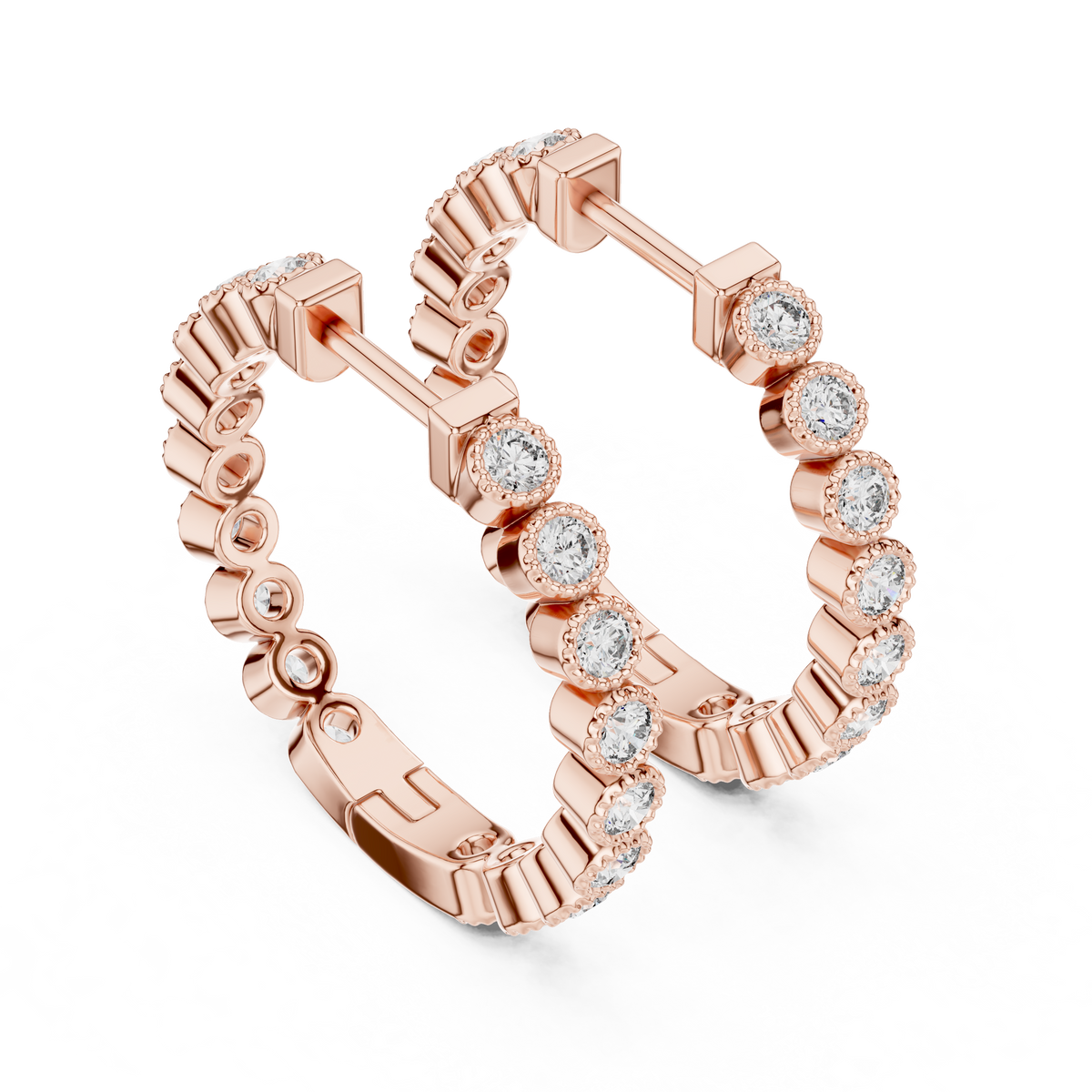 vintage-style round bezel-set diamond inside-out hoop earrings.  each hoop features a continuous line of individually bezel-set round brilliant-cut diamonds outlined with delicate milgrain beaded trim.