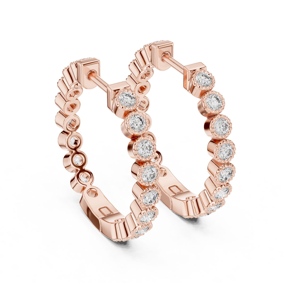 vintage-style round bezel-set diamond inside-out hoop earrings.  each hoop features a continuous line of individually bezel-set round brilliant-cut diamonds outlined with delicate milgrain beaded trim.