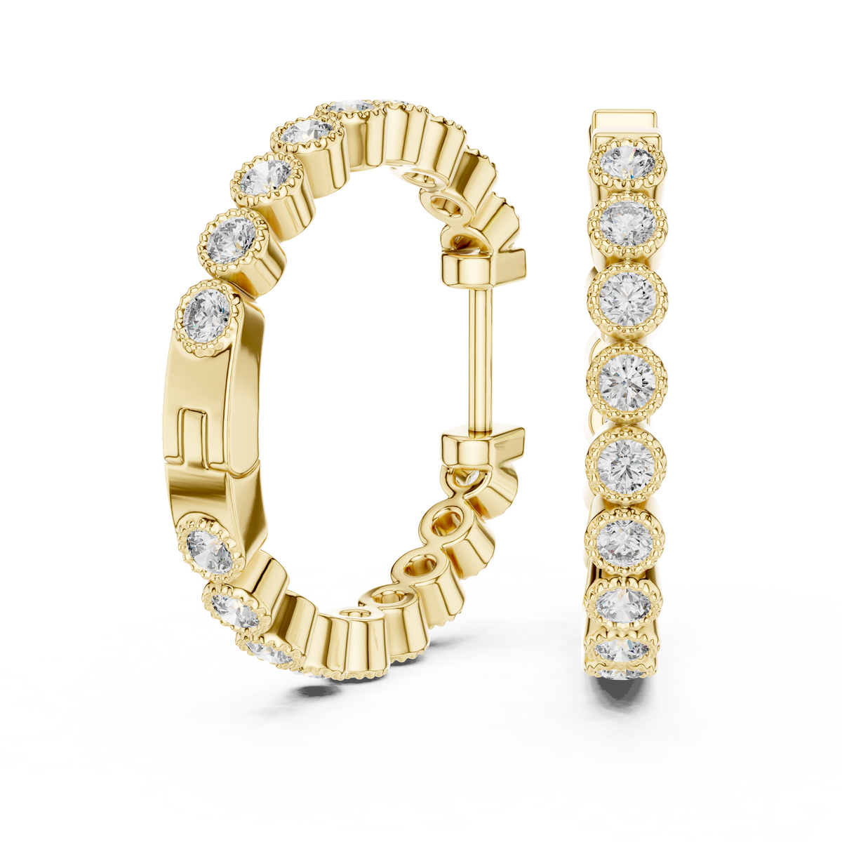 vintage-style round bezel-set diamond inside-out hoop earrings.  each hoop features a continuous line of individually bezel-set round brilliant-cut diamonds outlined with delicate milgrain beaded trim.