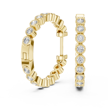 vintage-style round bezel-set diamond inside-out hoop earrings.  each hoop features a continuous line of individually bezel-set round brilliant-cut diamonds outlined with delicate milgrain beaded trim.