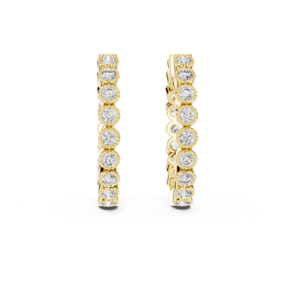 vintage-style round bezel-set diamond inside-out hoop earrings.  each hoop features a continuous line of individually bezel-set round brilliant-cut diamonds outlined with delicate milgrain beaded trim.